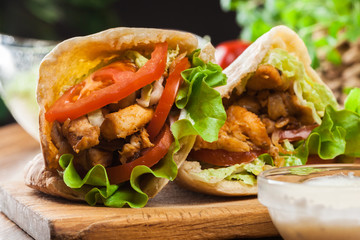 Doner kebab - fried chicken meat with vegetables