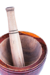 wooden mortar and pestle isolated on white background