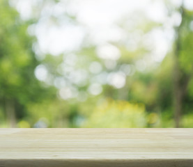 Empty table and blurred tree bokeh background for your product d