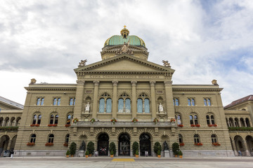 Fototapeta na wymiar The Swiss government building Bundeshaus or Federal Palace of Switzerland, headquarter one of the oldest democracies in the world, Berne, capital city of Switzerland.