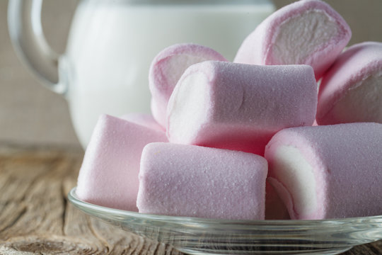 Pink Marshmallow With Milk On Wooden Table