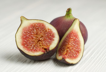 figs on white wooden background