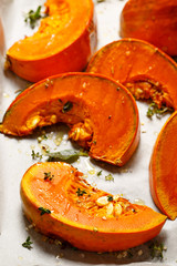 Roasted pumpkin with addition aromatic herbs, sea salt and olive oil