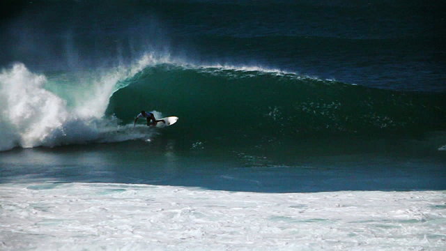 Hawaiian big wave surfing.