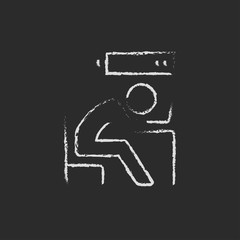 Bsinessman with low power icon drawn in chalk.