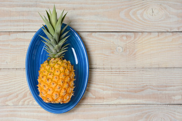 Pineapple on Blue Plate