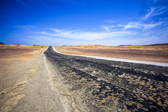 Road for the salt transportation through the desert of the Reserva Nacional de Paracas, Ica, Peru - South America © jeeweevh