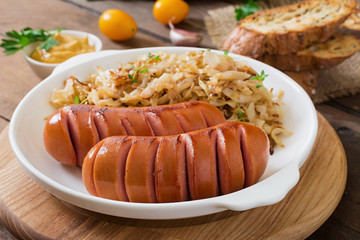 Sausages and fried cabbage