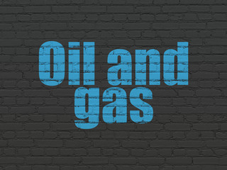 Manufacuring concept: Oil and Gas on wall background