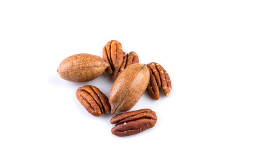 Few pecan nuts isolated on white