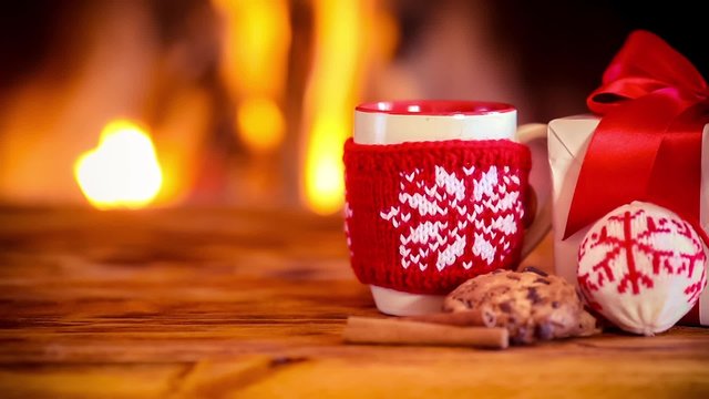 Christmas decorations against fireplace. Xmas holiday concept