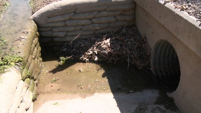Water running in a storm drain in Ojai, California.