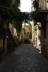 Fototapeta na wymiar narrow cobbled streets in trastevere Rome