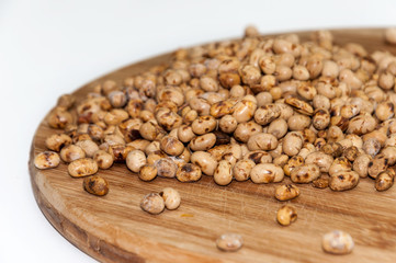 Soy beans on the wooden board