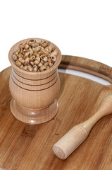 Soy beans in the wooden mortar