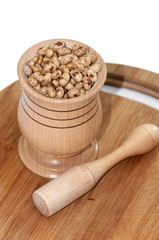 Soy beans in the wooden mortar