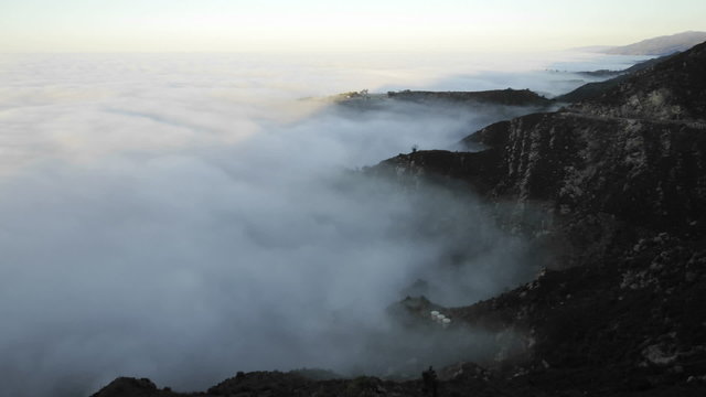 Time lapse of coastal fog at sunrise along the Santa Ynez Mountains above Montecito, California.