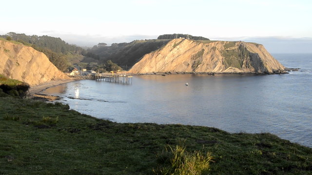 Sunset on Arena Cove from the Cypress Abbey County property at Point Arena, California.
