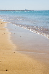 Fototapeta na wymiar The beach of the Black Sea in the Crimea in the summer