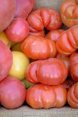 Red ripe tomatoes in a stack