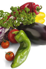 Mix of organic vegetables isolated on white.