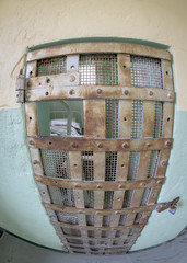Fisheye view of a Prison door with bars