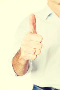 Mature man gesturing ok sign