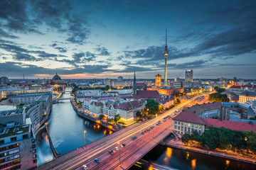 Fototapeta premium Berlin skyline with dramatic clouds in twilight at dusk, Germany