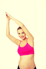 Obraz premium Pregnant woman relax doing yoga