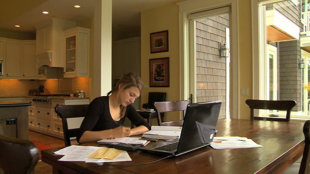MWS student studying at table with computer