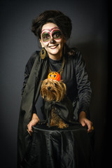 Portrait of woman and dog in disguise for Halloween