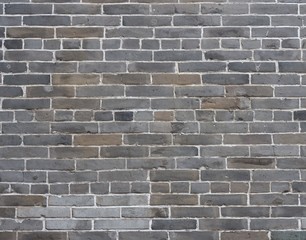 Grey colorful grunge brick wall background