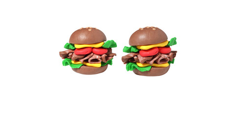 miniature cheese burger model from japanese clay on white background