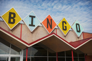Fototapeta premium aged and worn vintage photo of retro bingo sign
