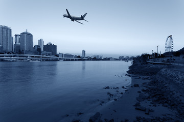 Fototapeta na wymiar Brisbane City and aircraft