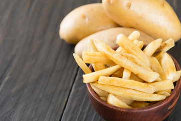french fries on wood background