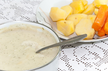 Dill sauce boiled potatoes and carrots
