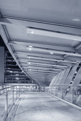 Empty pedestrian transition over busy street in urban city