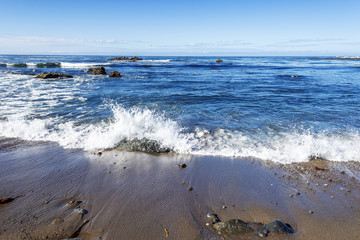 Rock and unusual geological formations at low tide, along the rugged Big Sur coastline, near Monterey, CA. on the California Central Coast.