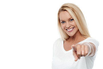 Pretty woman pointing you out