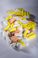 Stack of different colorful pills