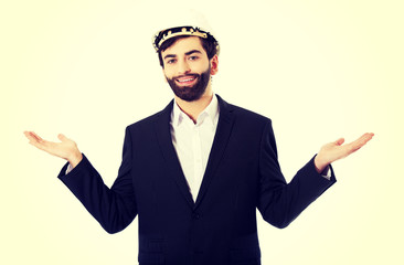 Businessman showing empty copyspace in hands.