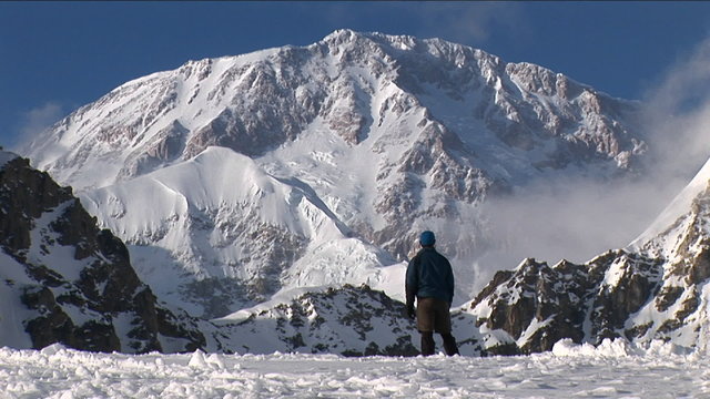 Climber looking up at his goal, Denali