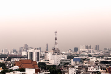 Fototapeta na wymiar Cityscape of Bangkok, antenna of communication building in city
