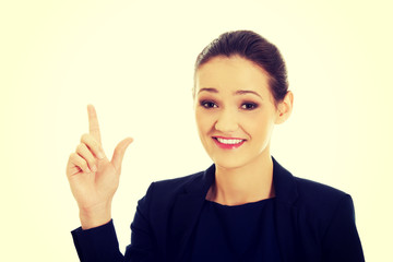 Businesswoman showing size with her fingers.