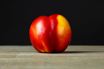 peach on the Board on a black background
