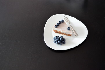 Yogurt cake with blueberries and biscuit base