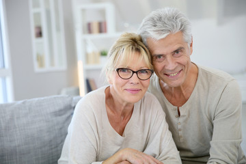 Happy senior couple embracing each other
