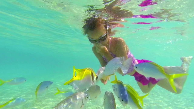Girl snorkelling underwater