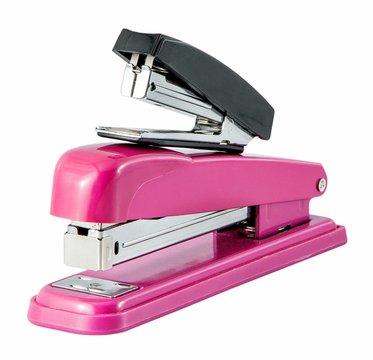 The two staplers isolated on a white background
